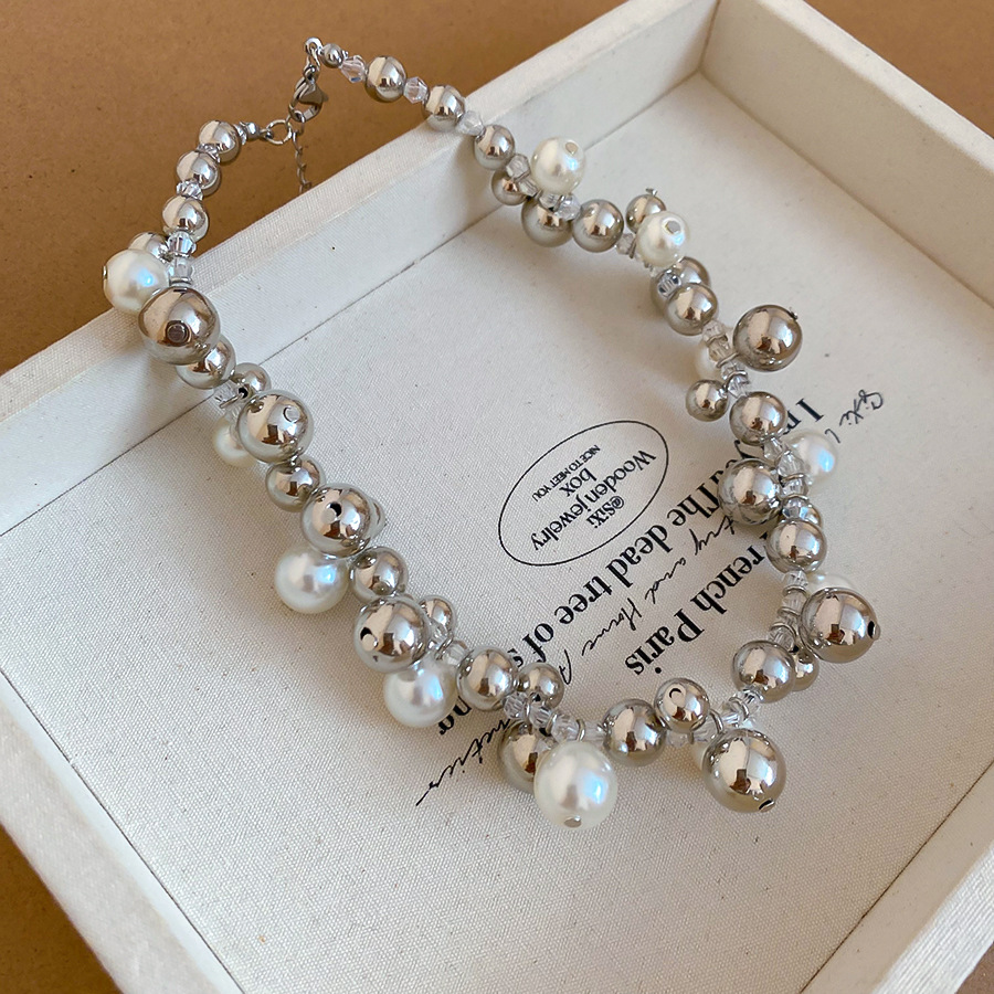 European American cross-border multi-layered pearl necklace, fashionable ins-style collarbone chain with a unique design and niche charm for women - view 5