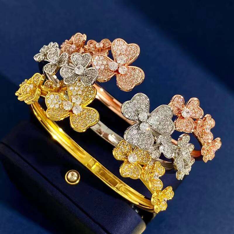 Fashionable new clover three-flower beaded stainless steel bracelet, with an open design, suitable as a gift for girls