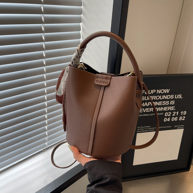 Brown Faux Leather Bucket Bag With Top Handle And Detachable Strap Includes Silk Scarf Accent - view 3