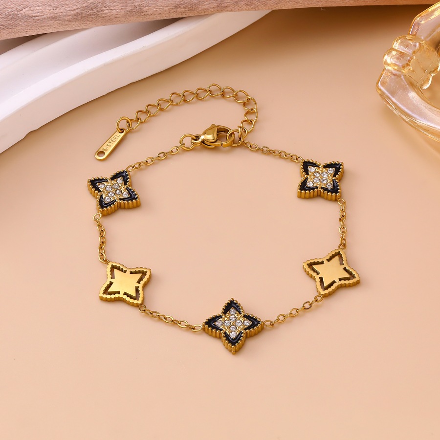 Luxurious sophisticated diamond-embellished four-leaf clover bracelet, necklace, and earrings stainless steel set for women - view 4