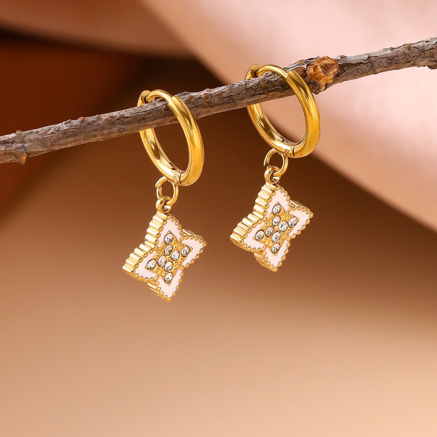 Exclusive cross-border geometric micro-inlaid zircon four-leaf clover earrings, niche high-end light luxury style stainless steel oil-drip earrings - view 5