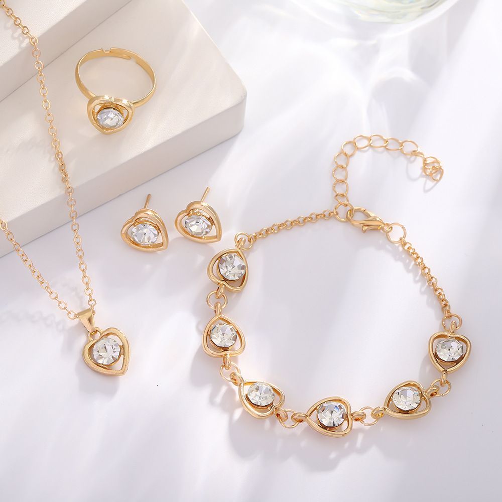 18K Gold Plated Hollow Heart Zircon 4Pcs Jewelry Set Women Necklace Stud Earrings Bracelet Open Ring - view 3