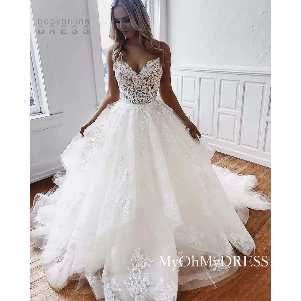 Spaghetti Straps Beach Boho Wedding Dresses Sexy Backless A Line Long Tulle Bridal Gowns Court Train Lace Appliques Bride Dress Y626