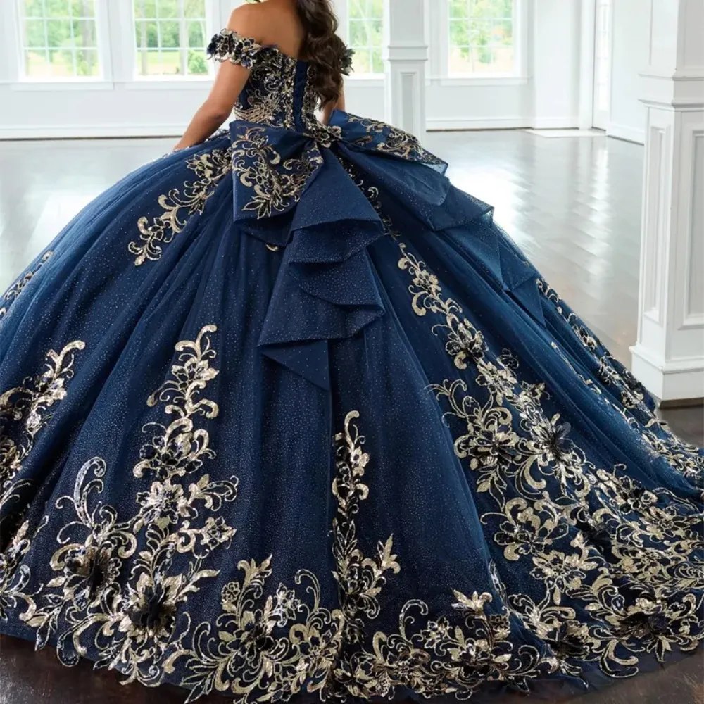 Navy blue off-shoulder dress with small cuffed sleeves, heavy beaded crystal embellishments, and a full tulle skirt Quinceanera - view 4