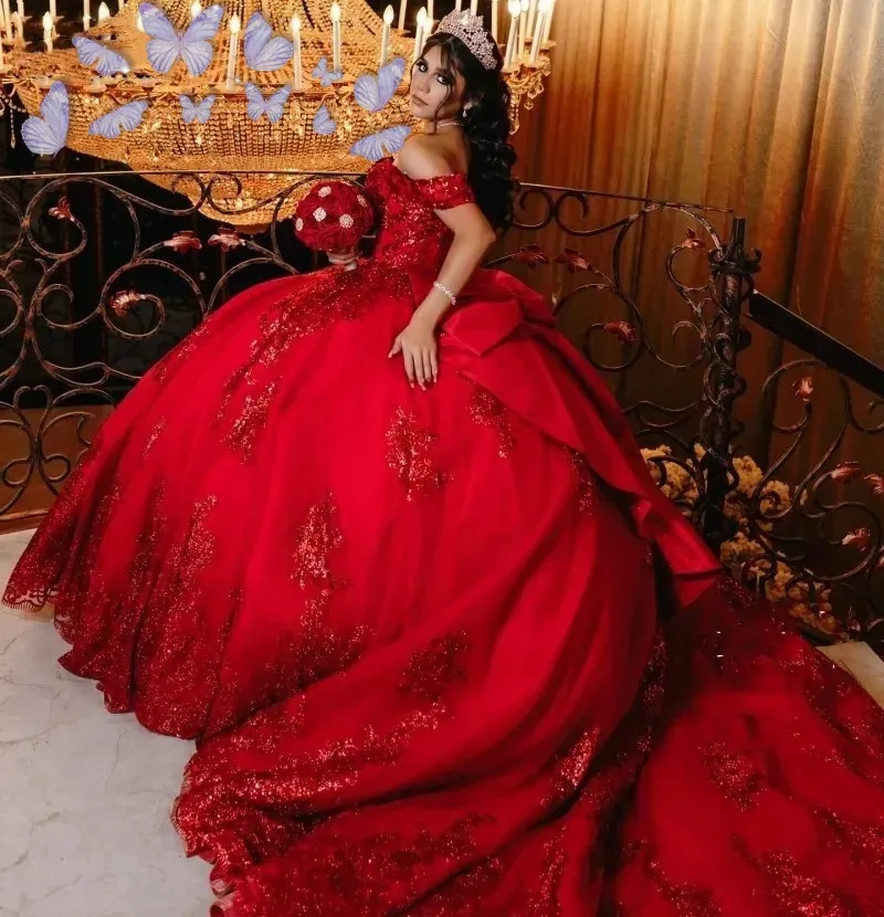 Bright red off-shoulder short-sleeve dress with glittering pearl decorations, big bow, and puffed tail Quinceanera dress