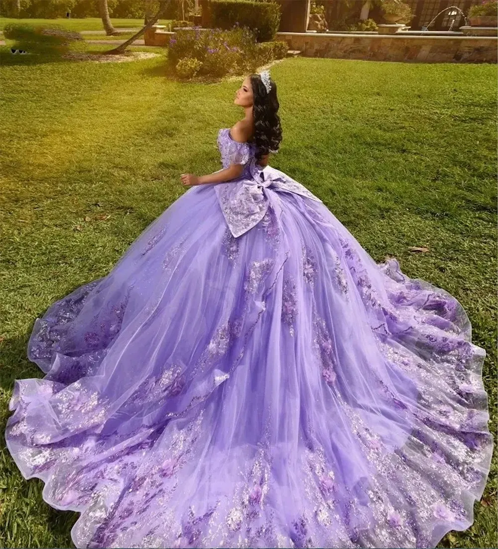 Light purple off-shoulder short-sleeve dress with a big bow on the back, glitter tulle train, and full skirt Quinceanera dreamy princess dress