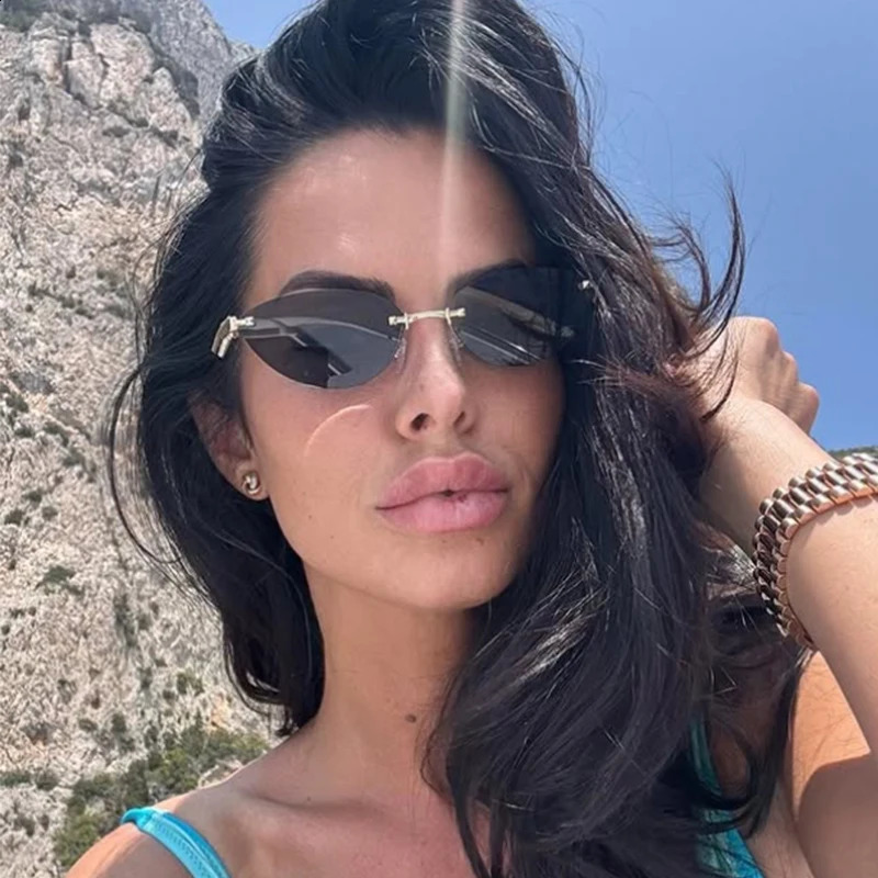 Unique Rimless Brown Sunglasses Women 2025 Metal Frameless Cat Eye Glasses Woman Small Frame High-end y Eyewear 260626 - view 3