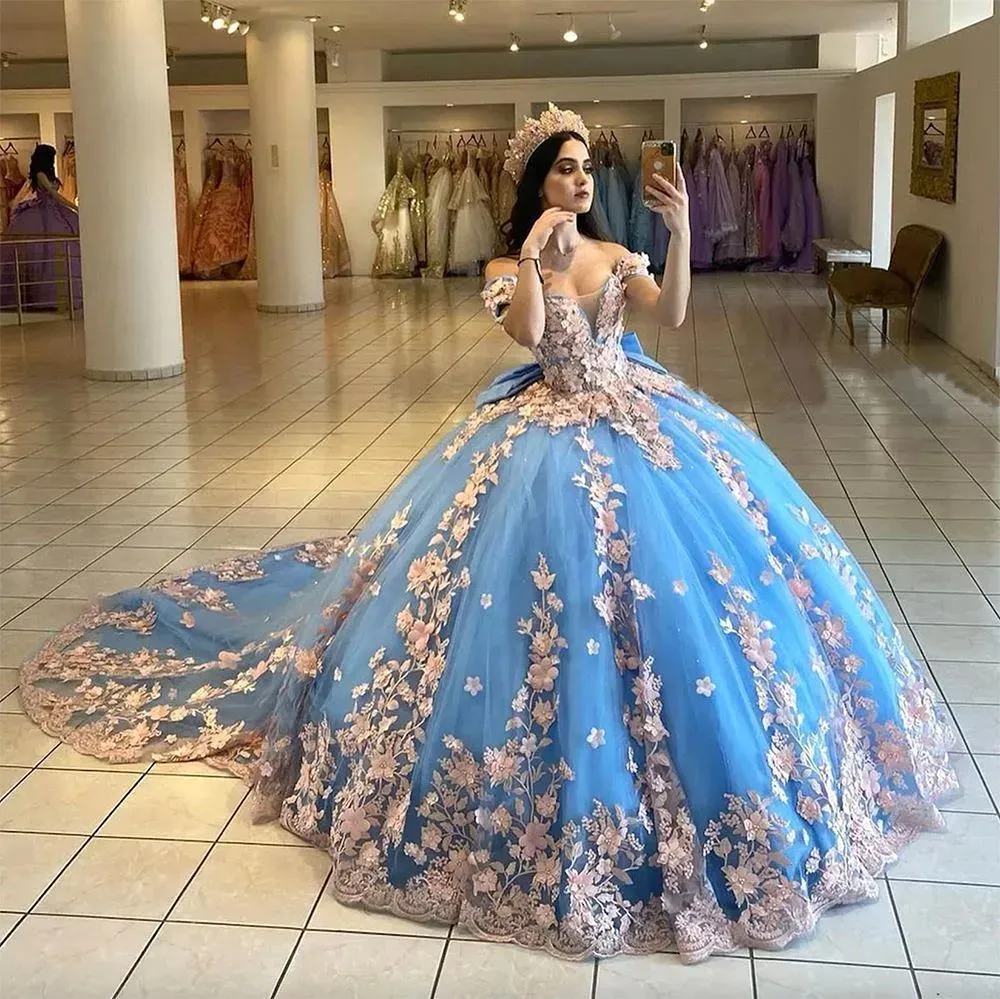 Royal blue off-shoulder dress with pink rose lace, big bow, and super long tulle train Quinceanera color-block dress