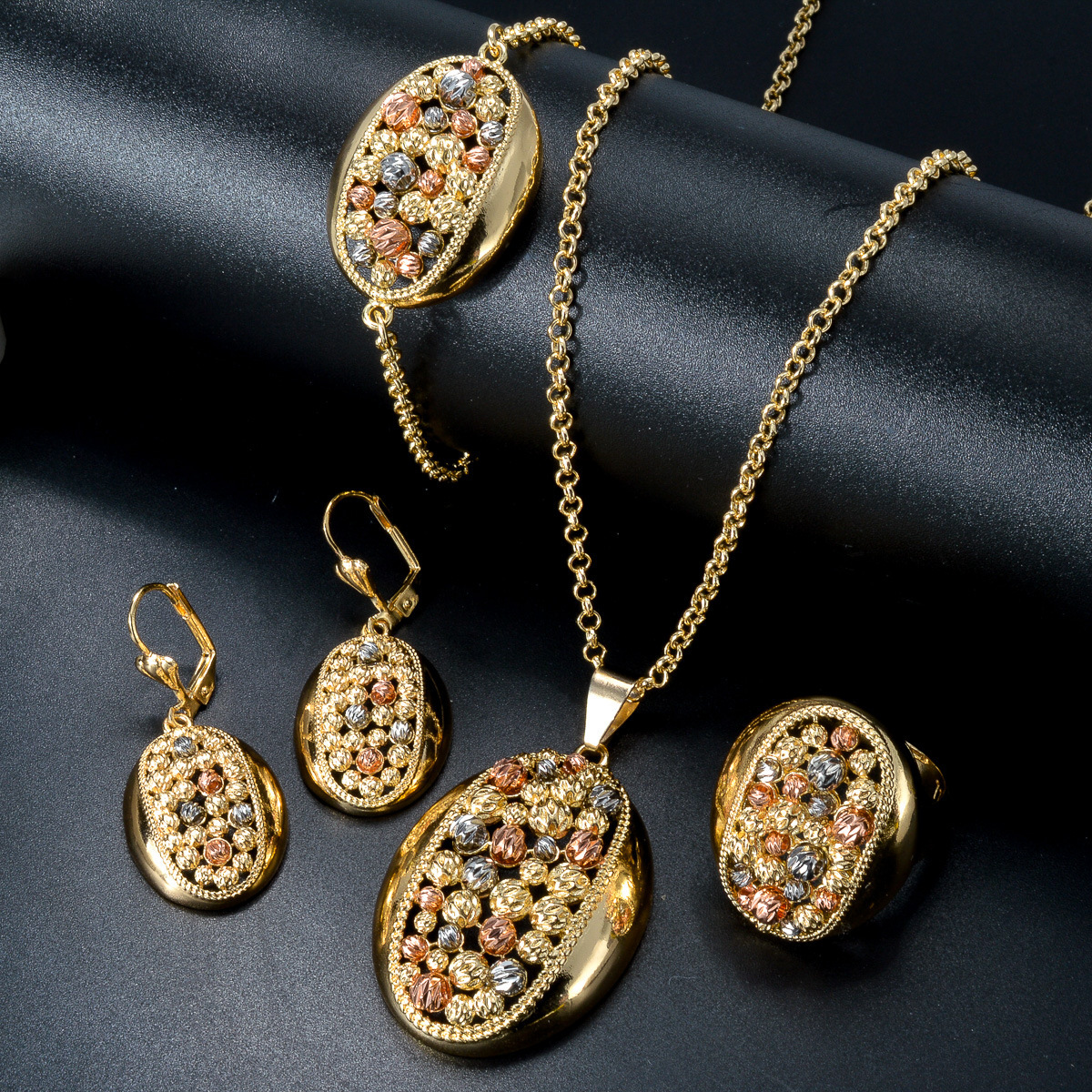 Necklace Bracelet Jewelry New Product: Oval Hollow Electroplated Steel Bead Necklace Bracelet Earrings Ring Niche Design Set