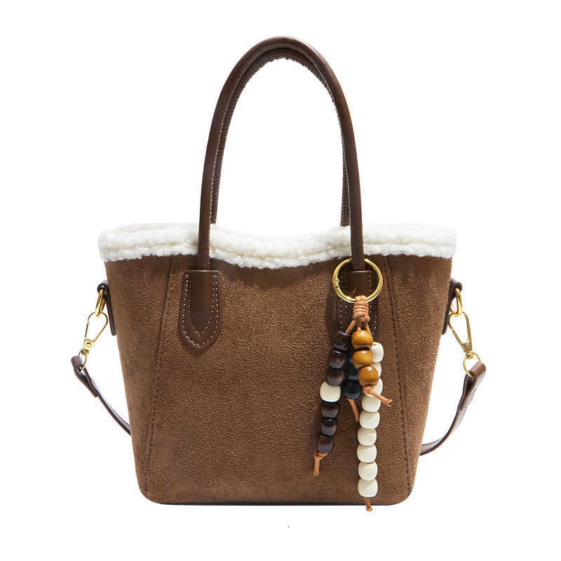 New 2025 style crossbody tote bag with large capacity and chic high-end leopard print. Perfect for carrying essentials while exuding a sophisticated H