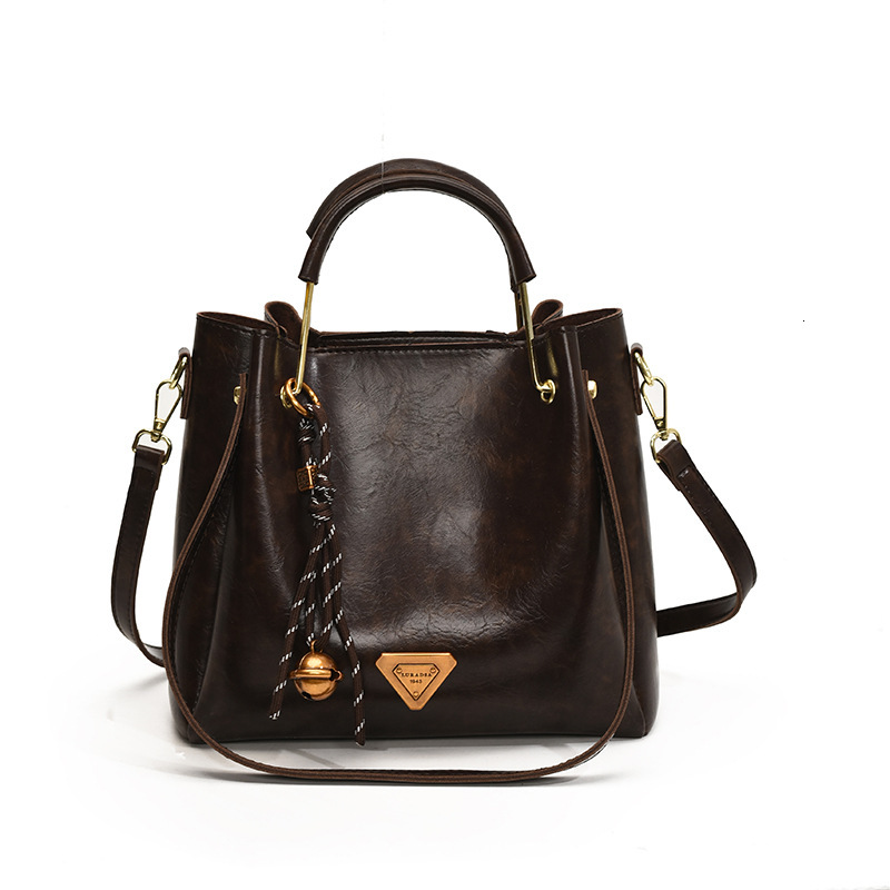 Vintage Oil Wax Leather Bucket Handbag Dual Handle Crossbody Bag With Bell Tassel Charm For Women Daily Work - view 6