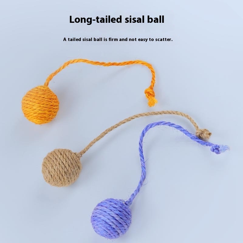 Cat with self satisfied, nibbg on multi-color playful cat toy, sisal ball, grinding teeth, making sound hemp rope tail ball