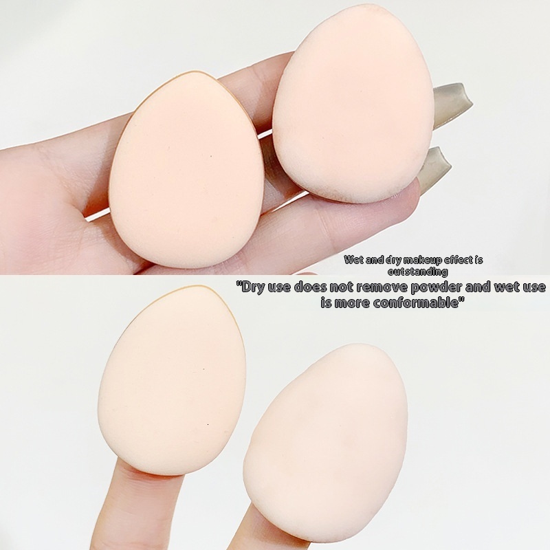 Compact Xixi Thumb Puff Concealer - No Powder Needed, Egg Drop Shaped for Both Dry and Wet Application