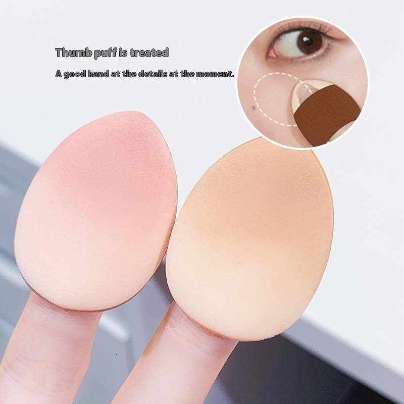 Compact Xixi Thumb Puff Concealer - No Powder Needed, Egg Drop Shaped for Both Dry and Wet Application