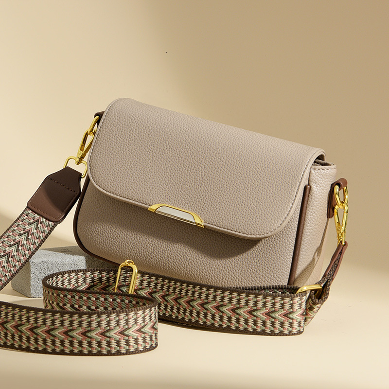 2024 minimalist and popular cowhide patterned flap small square with double strap diagonal cross single shoulder bag, giving mother genuine leather wo