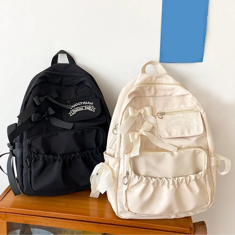 Home>Products>Fashionable selling Girls School Backpack with Bow Youth Anti theft Canvas Womens Shoulder Bag 240903