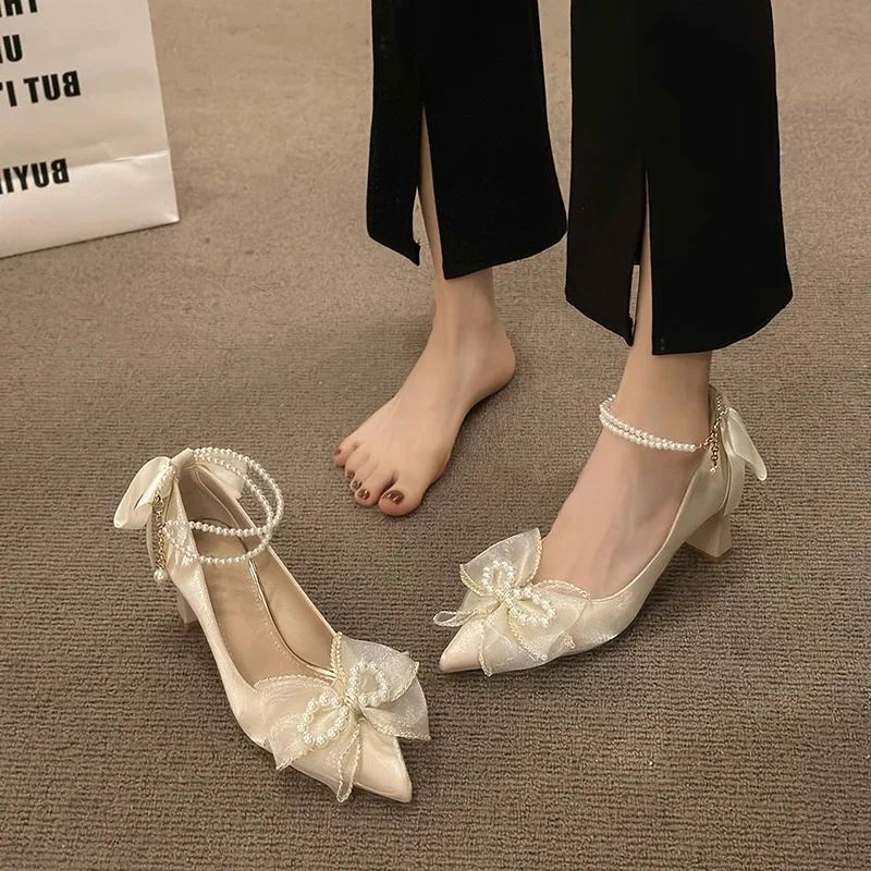 2025 NEW Belt Pearl Pointed Thick High Wedding Bow Toe Button Middle Heel Party Sandals atillas Mujer f