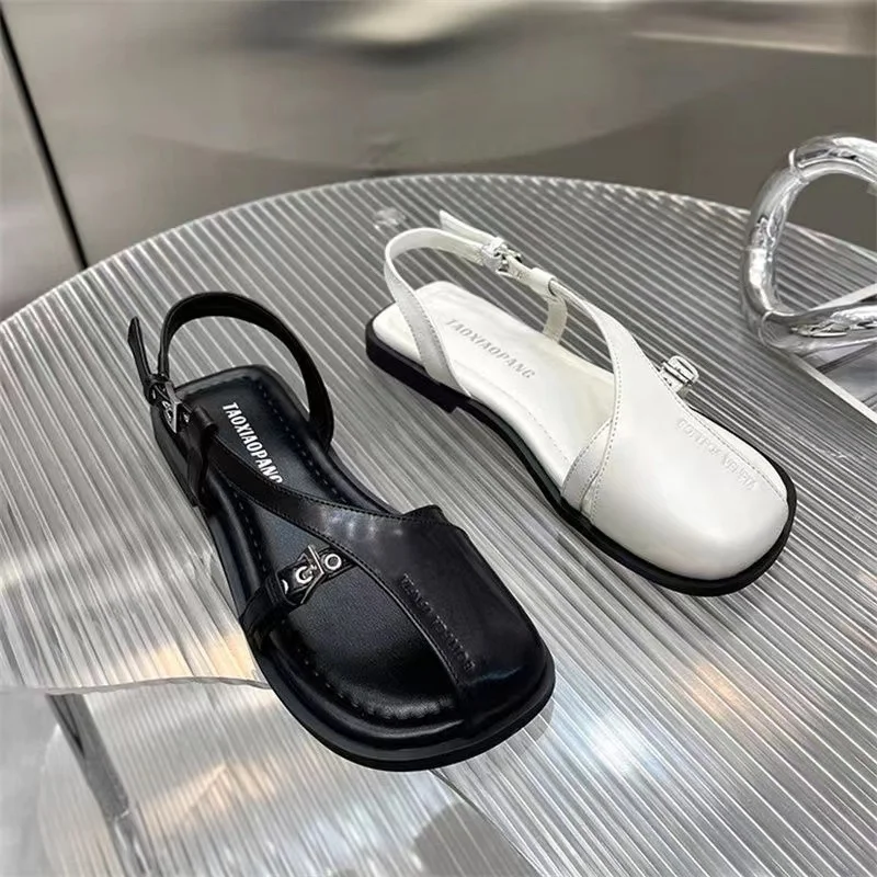 Summer 2024 New Baotou New Hollow Soft Leather Flat One Word Buckle Casual Fashion Women Platform Sandals 450c