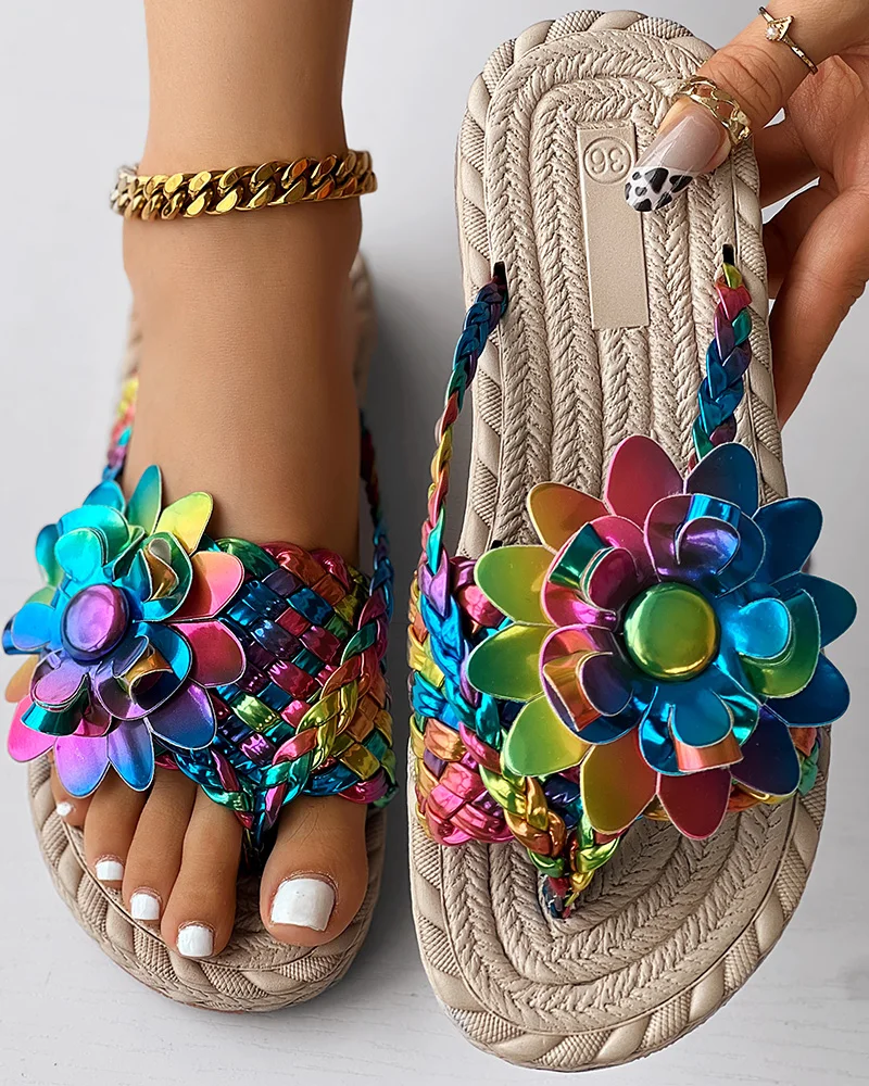 Women's Casual Flip Flops with Braided Holographic Straps and Floral Toe Post Design Comfortable Flat Sandals for Beach and Vacation Wear