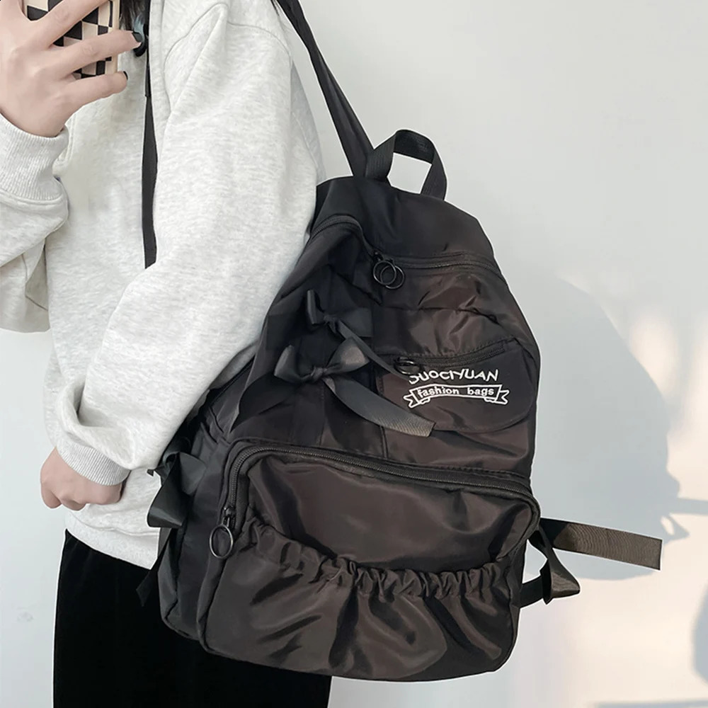 Home>Products>Fashionable selling Girls School Backpack with Bow Youth Anti theft Canvas Womens Shoulder Bag 240903