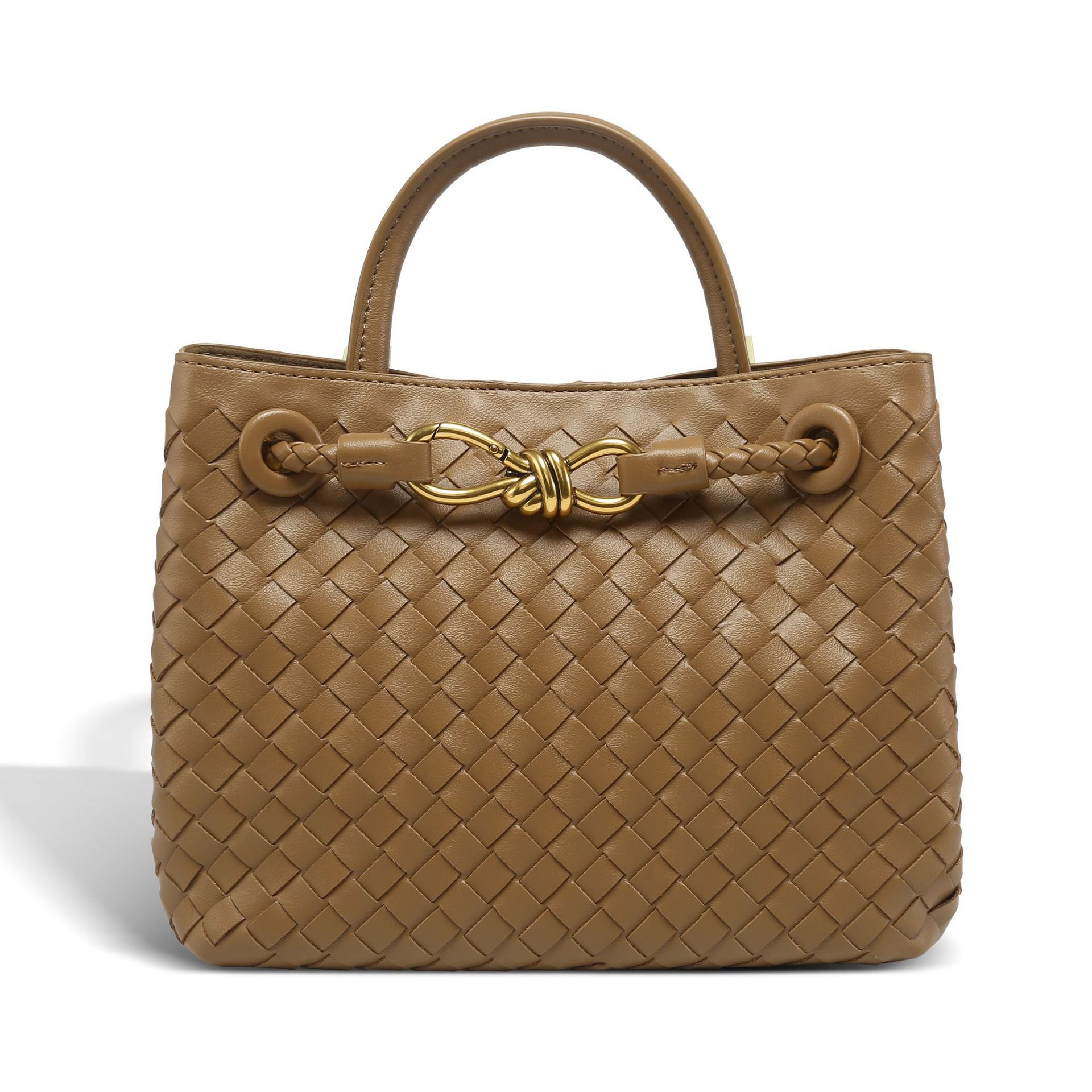 Bow metal rope genuine leather woven explosive versatile and simple tote 2025 new shoulder bag, hand-held large capacity retro women's bag