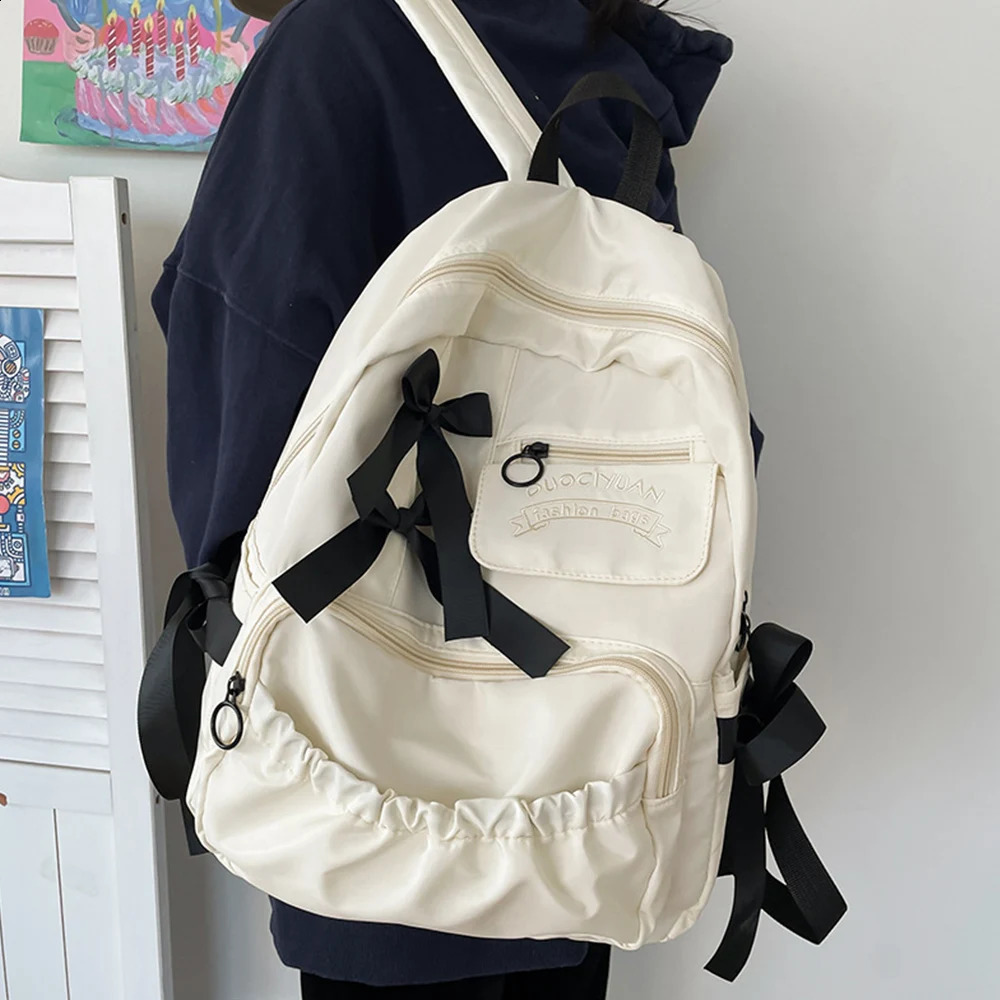 Home>Products>Fashionable selling Girls School Backpack with Bow Youth Anti theft Canvas Womens Shoulder Bag 240903