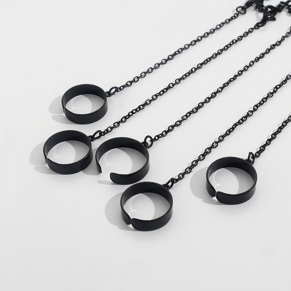 Stylish Link Bracelet and Interlocking Rings for a Trendy Punk Look