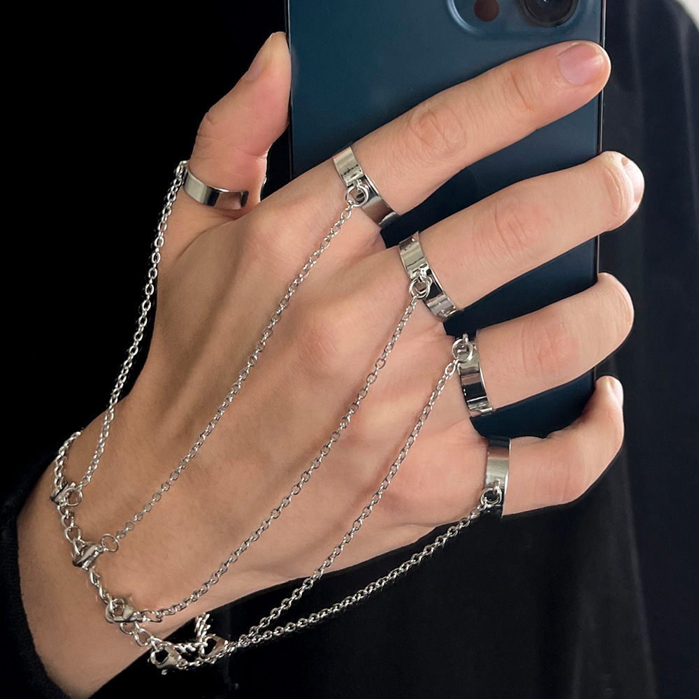 Stylish Link Bracelet and Interlocking Rings for a Trendy Punk Look