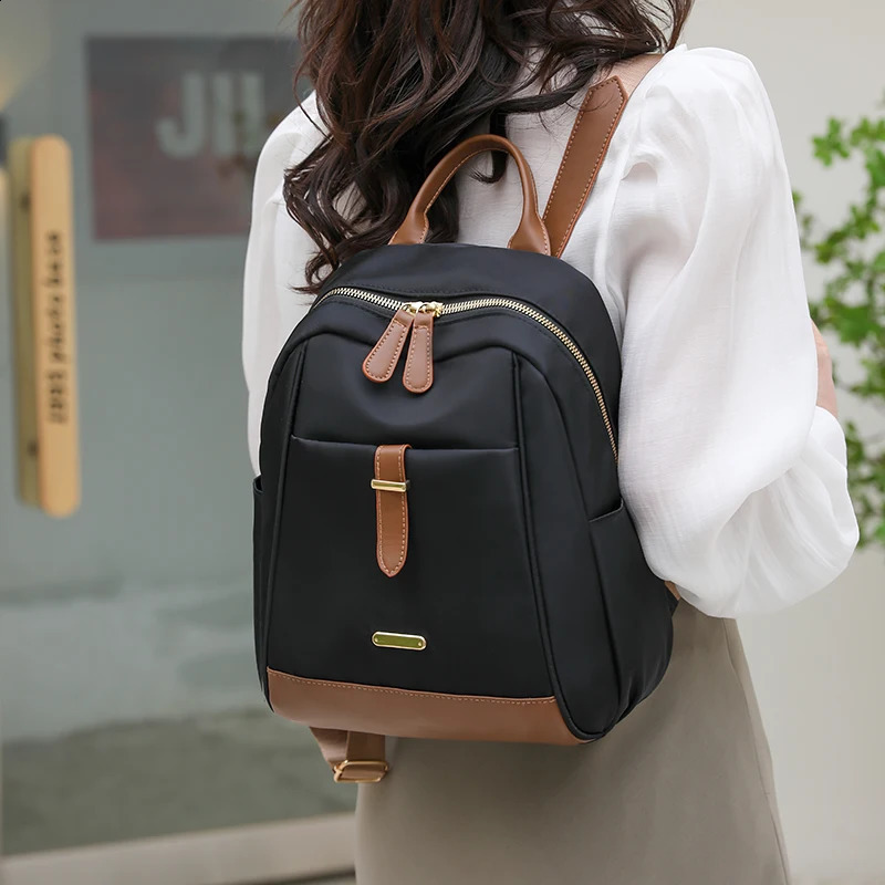 Womens waterproof nylon fashionable highcapacity backpack womens Versatile Travel Rucksacks casual simple student 240906