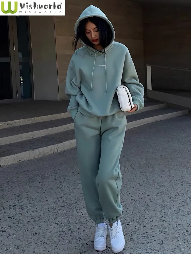 Autumn and winter loose casual solid color sports top set for women fashionable temperature age reduction two-piece set 240903