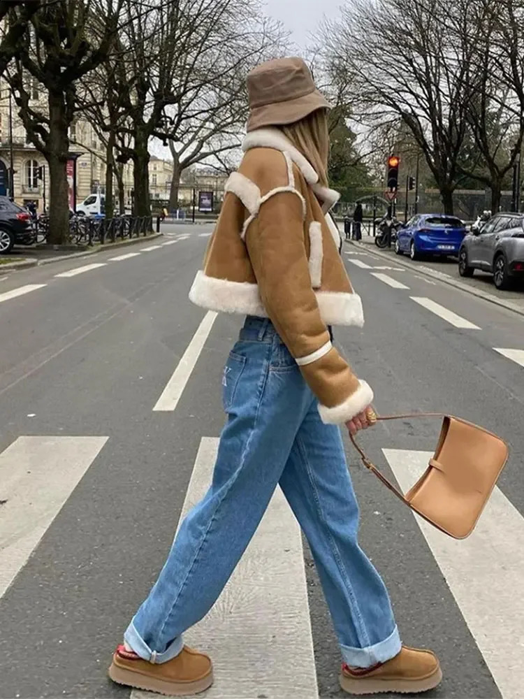 Womens autumn and winter plush patchwork leather jacket elegant lapel long sleeved cut fashionable womens streetwear 240905