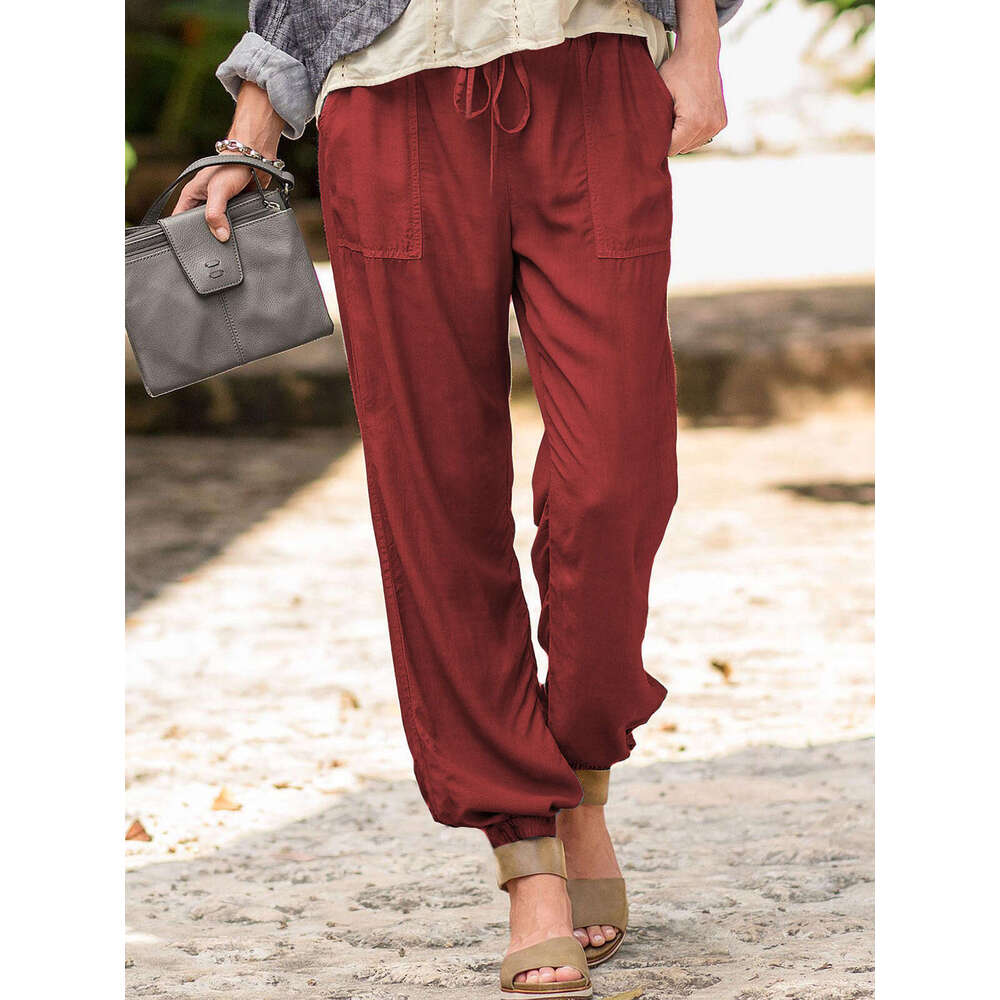 Women's summer new lace up solid color elastic ankle pocket casual pants
