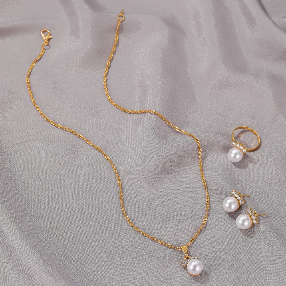 Elegant Pearls Crown Jewels Collection - Perfect Set of Earrings, Rings, and Necklaces for Special Occasions