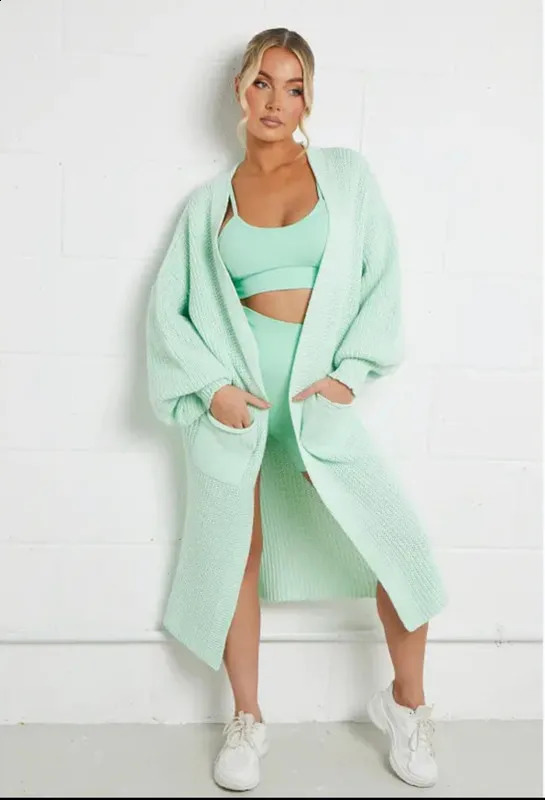 Womens sweater autumnwinter Vneck long sleeved solid color knitted pocket cardigan coat oversized womens clothing 240905