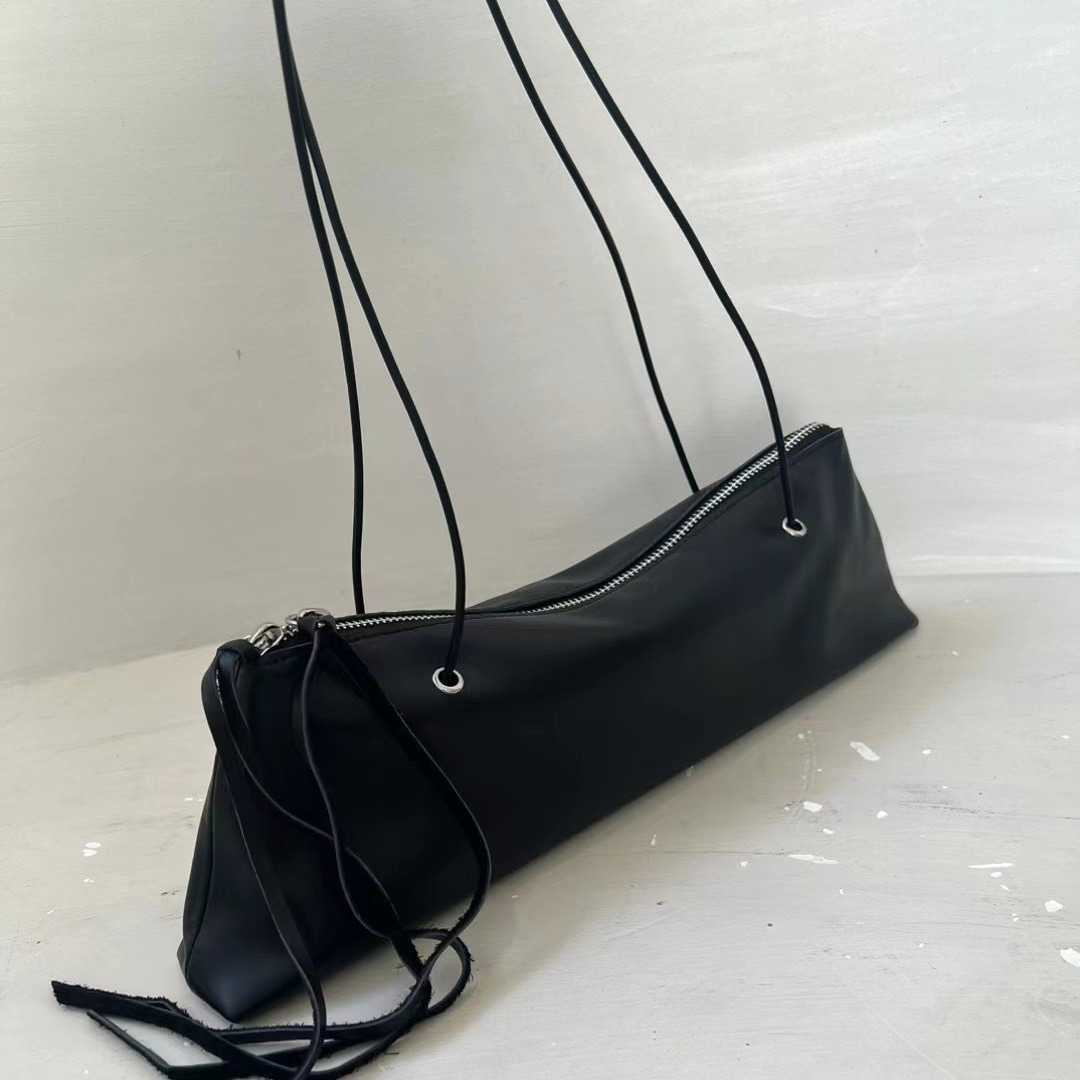 Niche top layer cowhide hand-held shoulder bag, oil wax cowhide rope shoulder strap bag 240915