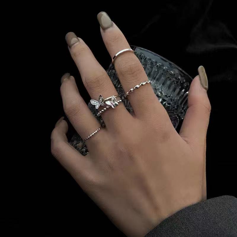 Minimalistic Geometric Butterfly Finger Rings - 4-Piece Adjustable Set for Trendy Fashion Lovers