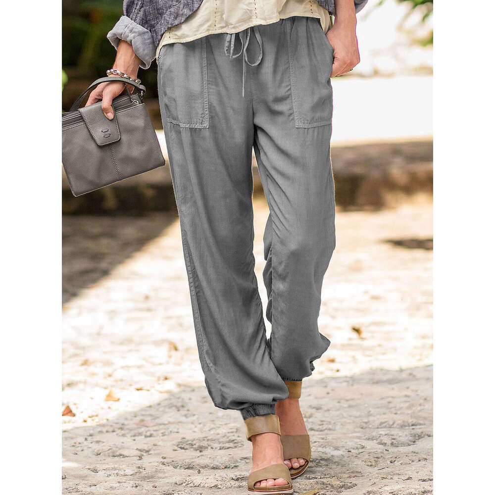 Women's summer new lace up solid color elastic ankle pocket casual pants