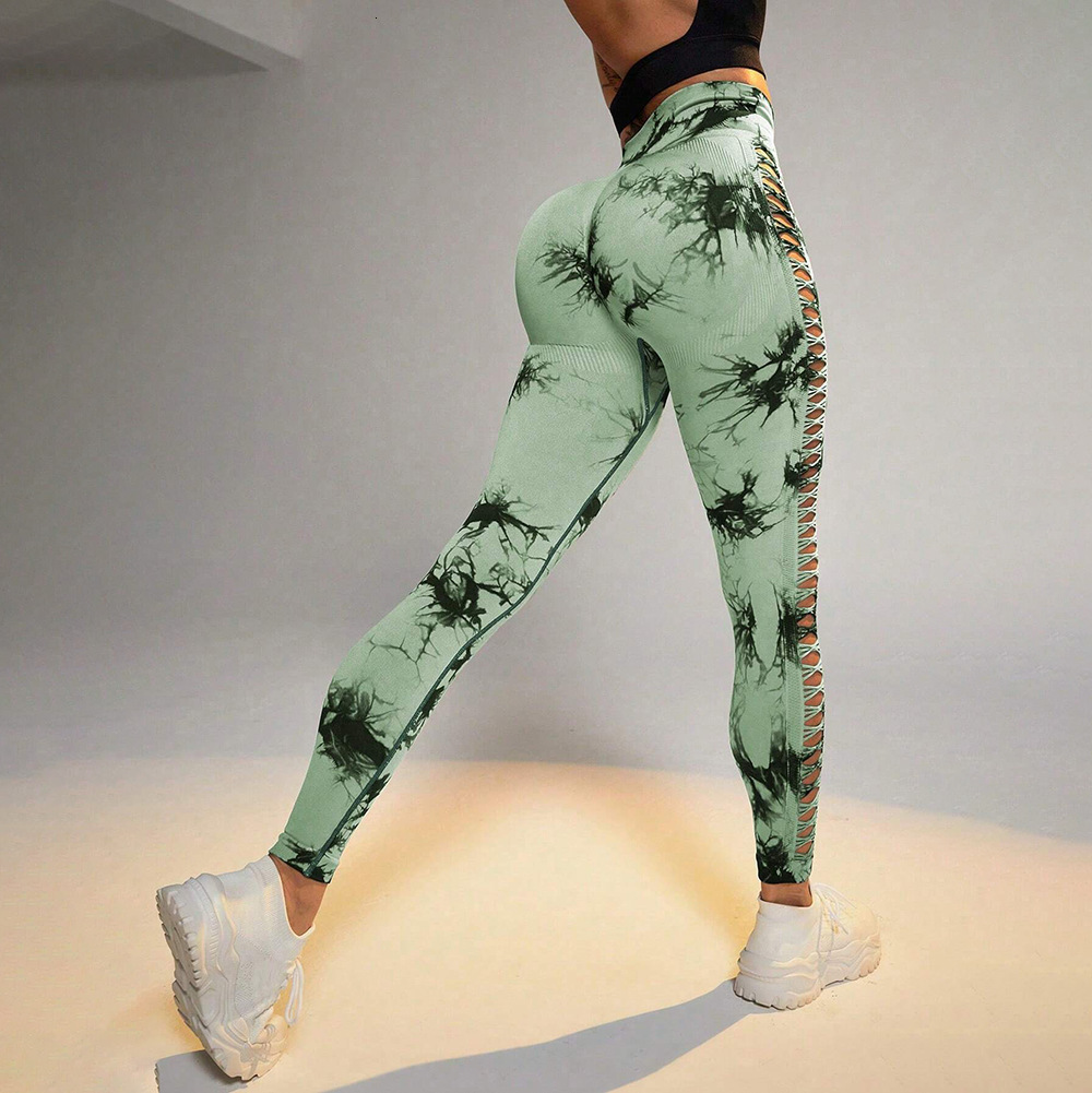 Seamless tie dye nude peach hip hollow out quick drying fitness beauty sports yoga pants for women
