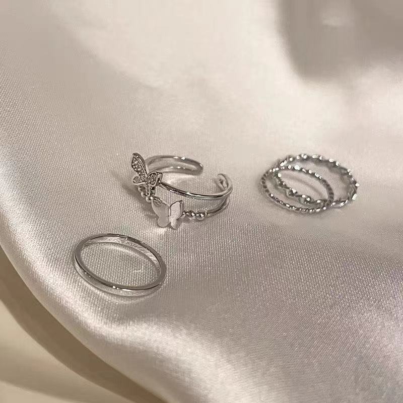 Minimalistic Geometric Butterfly Finger Rings - 4-Piece Adjustable Set for Trendy Fashion Lovers