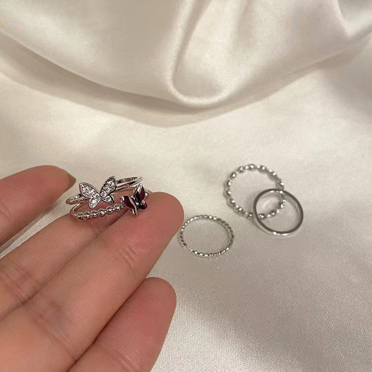 Minimalistic Geometric Butterfly Finger Rings - 4-Piece Adjustable Set for Trendy Fashion Lovers