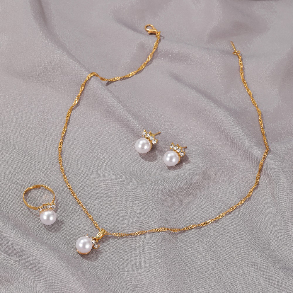 Elegant Pearls Crown Jewels Collection - Perfect Set of Earrings, Rings, and Necklaces for Special Occasions