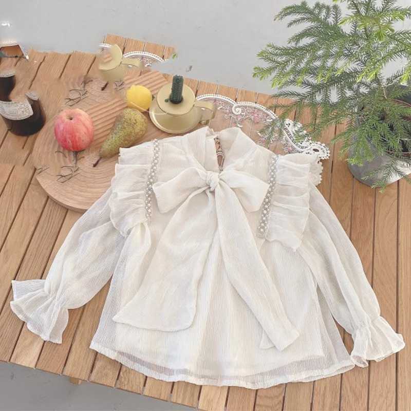 Autumn Girls Shirt Ladies Style Beaded Tie Bow Tops Pressurized Wrinkle Stitching Flared Sleeve Spring Girls Fashion Kids Outfit Y240906