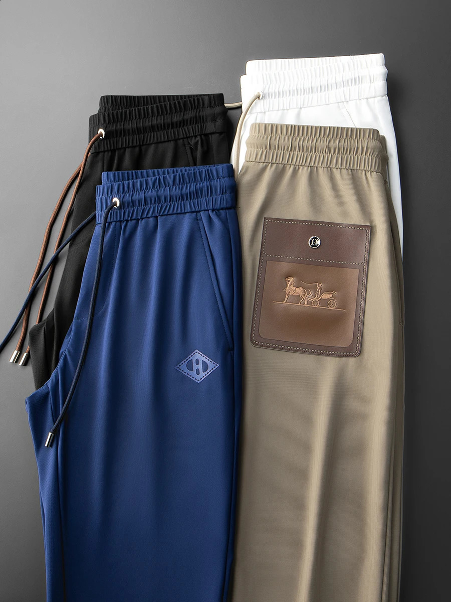 JSBDNZ summer highend fashion trend ice silk texture waffle color pocket mens sports and leisure pants 240905