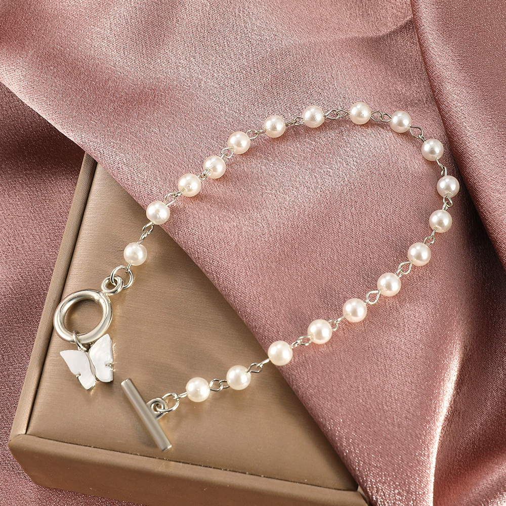 Minimalist Butterfly Pearl Charm Bracelet with Adjustable O-Ring Closure