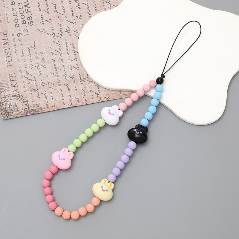Yilian's new butterfly bow mobile chain, colorful bead phone case, rope, short and cute hanging chain bag decoration for women