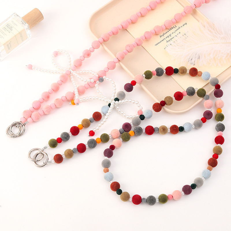 New autumn and winter plush ball bead mobile phone lanyard, pearl bow crossbody chain, backpack, keychain pendant