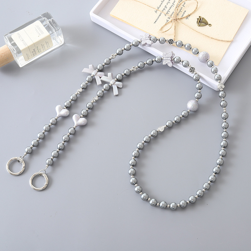 New pearl love bow crossbody chain, luggage keychain pendant, long phone hanging rope, can be carried and anti lost rope