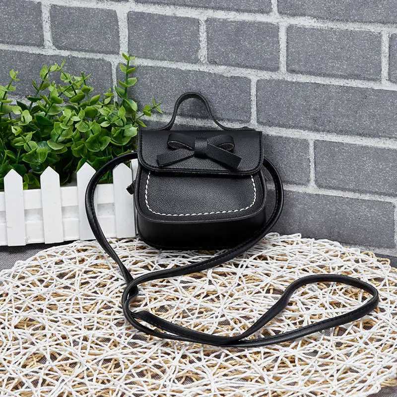 2021 Childrens Bow Cross Bag Fashion Cute Girl Mini Coin Wallet Fashion Pu Leather Handbag W240906