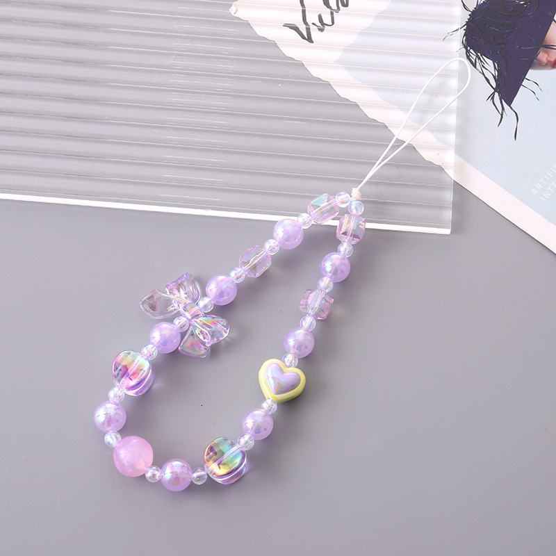 Yilian's new color plated bow mobile chain fashionable, small, fresh. The phone case has a hanging rope that prevents loss falls, and the wrist s