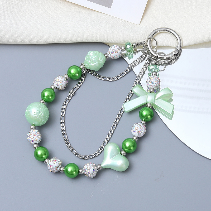 Creative new acrylic love bow double chain diamond ball mobile phone lanyard luggage keychain pendant